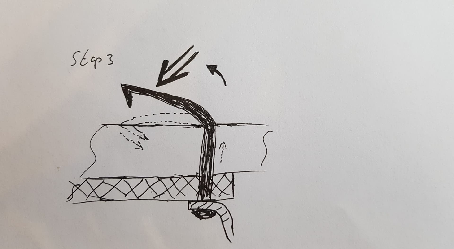 Door en door nagelen stap 3, nagel omslaan en platslaan in het handvat